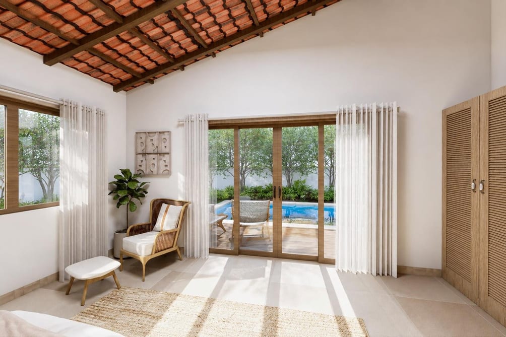 Bedroom opening directly onto the pool deck through full-height sliding doors